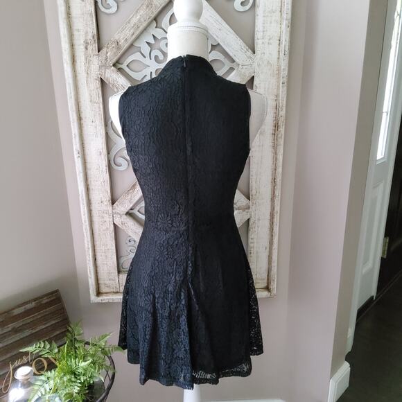 Francesca's Women's Sleeveless Lace Mock Neck Fit & Flare Mini Dress in Black - Picture 5 of 13